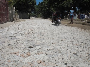 The road to Obinson Joseph's School - paved with broken rubble